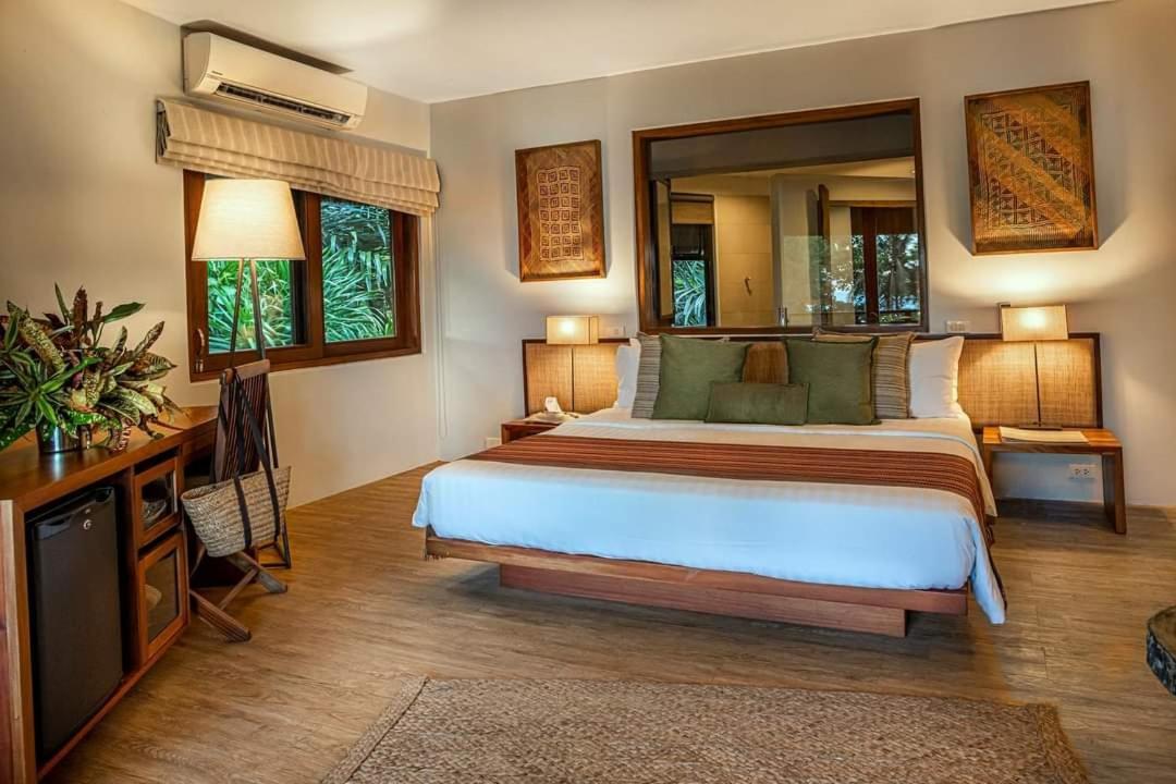 Amun Ini Beach Resort&Spa Anda  Exterior foto
